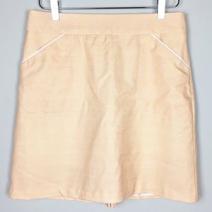 {Peter Millar} Orange and white dot golf skirt